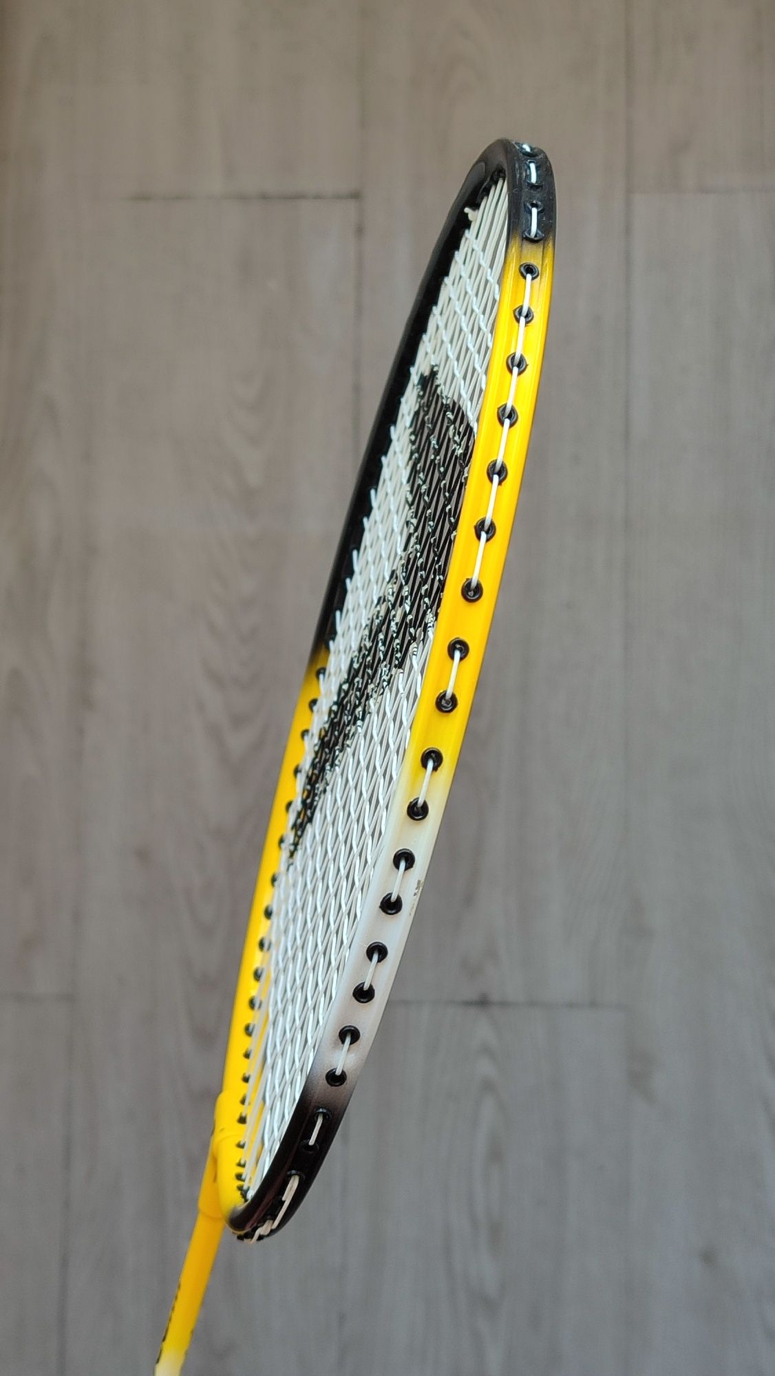 Raquete de badminton