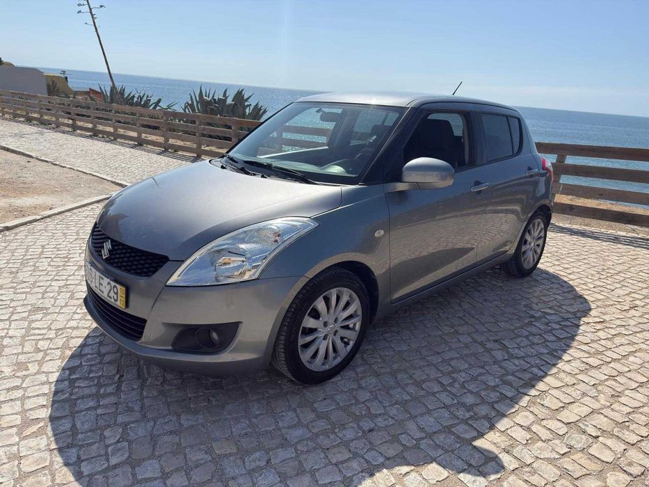 SUZUKI SWIFT 1.2 1 DONO LIVRO DE REVISÕES 2 CHAVES