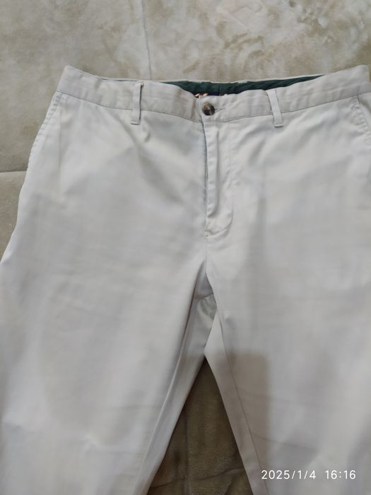 Calças de cor creme da marca Sacoor