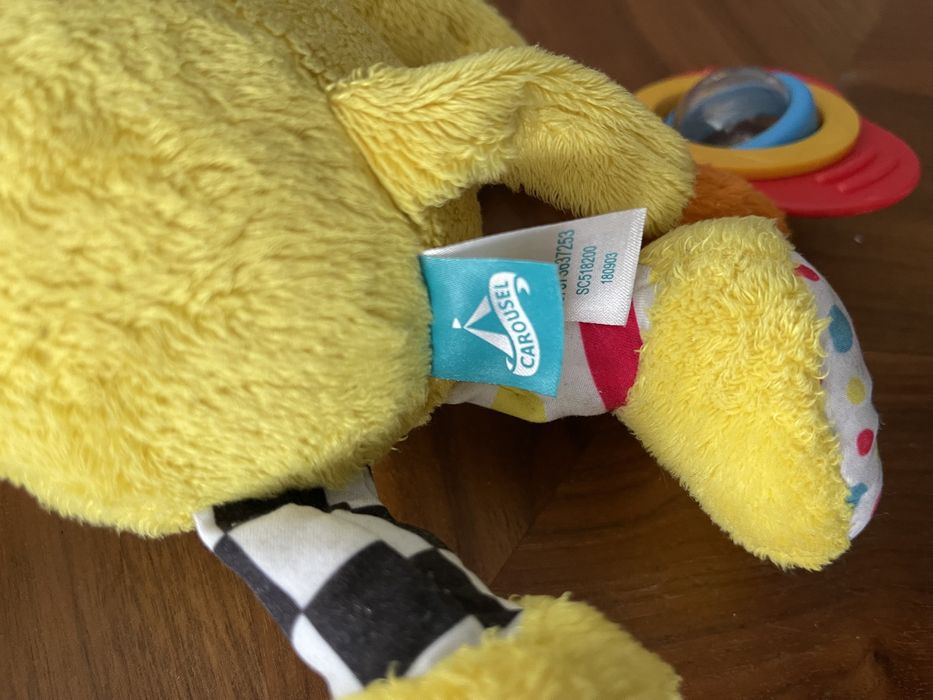 Zabawka niemowlęca zawieszka do wózka lew Carousel grzechotka wibruje