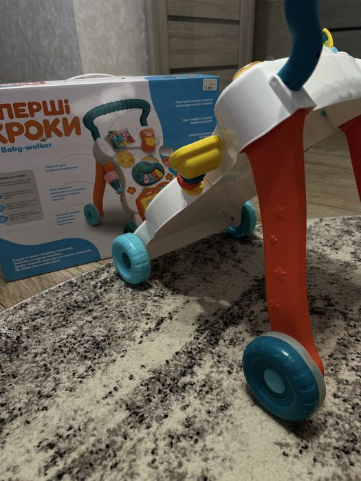 Ходунки каталка з ігровим центром