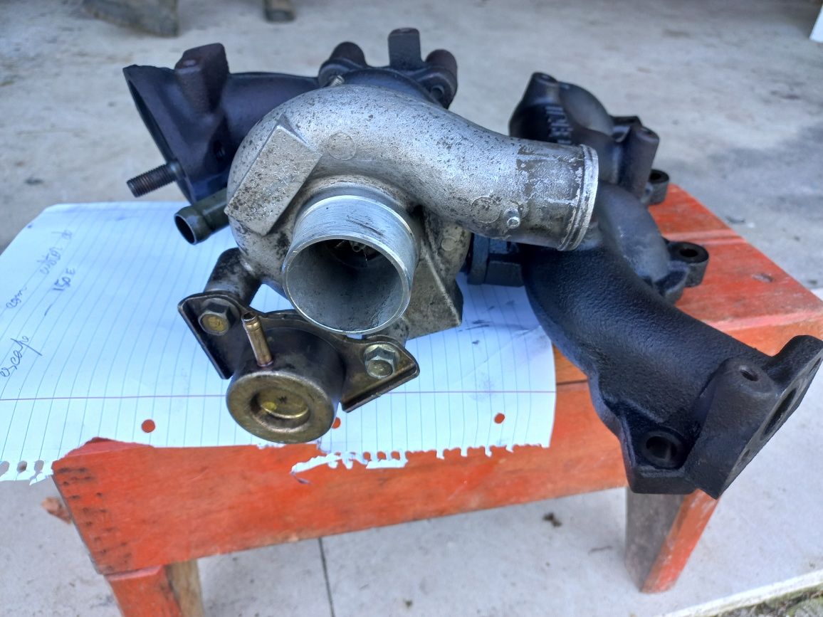 Turbo e coletor de escape (peça de motor Opel Combo))