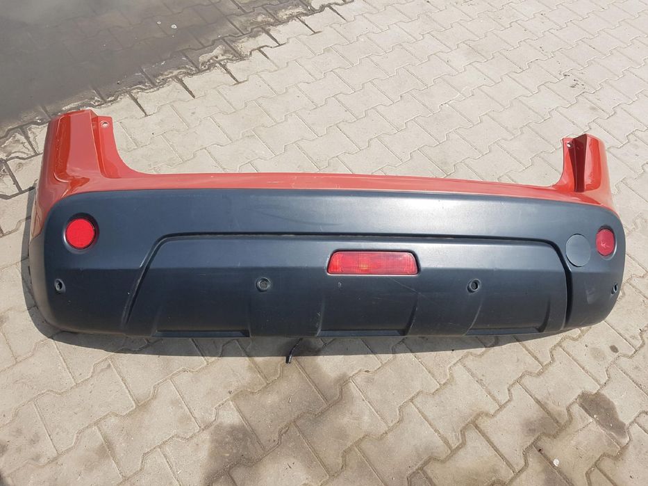NISSAN QASHQAI I J10 06-09r ZDERZAK TYŁ A52G