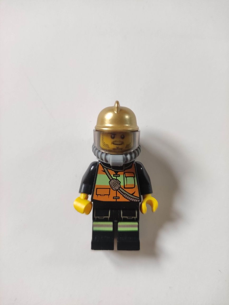 Figurka Lego Strażak (4 sztuki) z akcesoriami , stan idealny