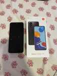 Redimi note 11 usado, com marcas de uso porem funcionando normamente.