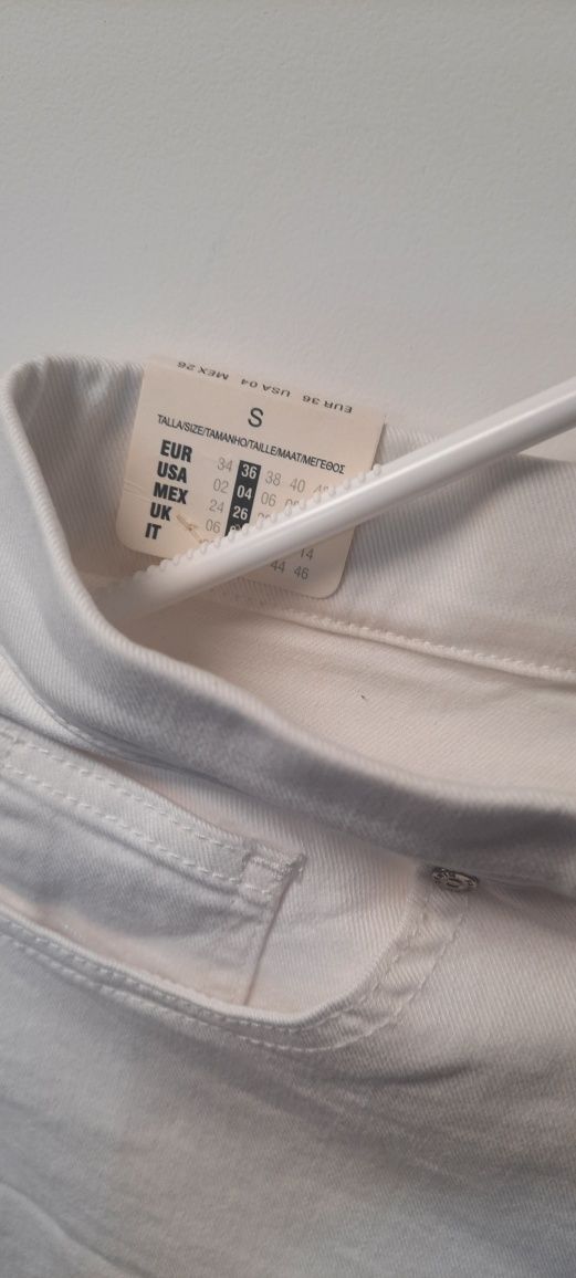 Białe z metką rurki skinny przetarcia rozm 36 S