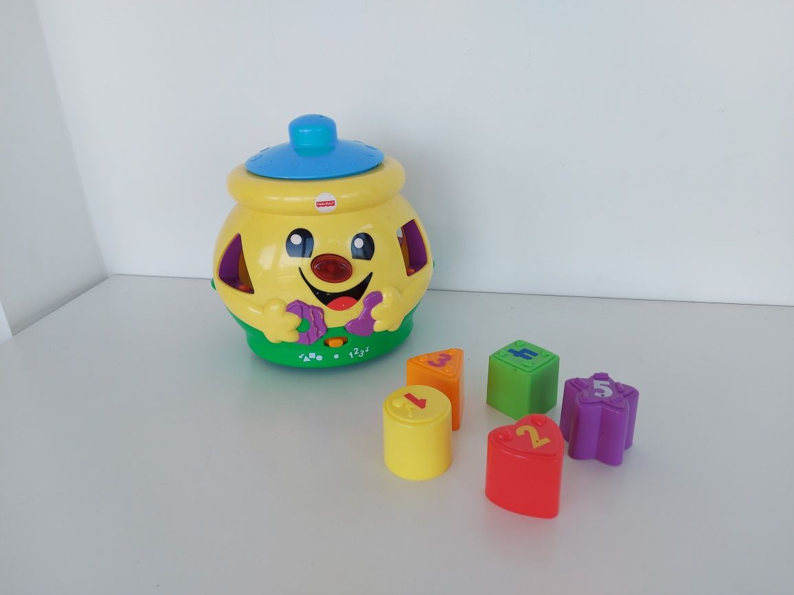 Garnuszek na klocuszek Fisher-Price