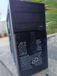caixa de computador da Fujitsu com fonte de alimentação