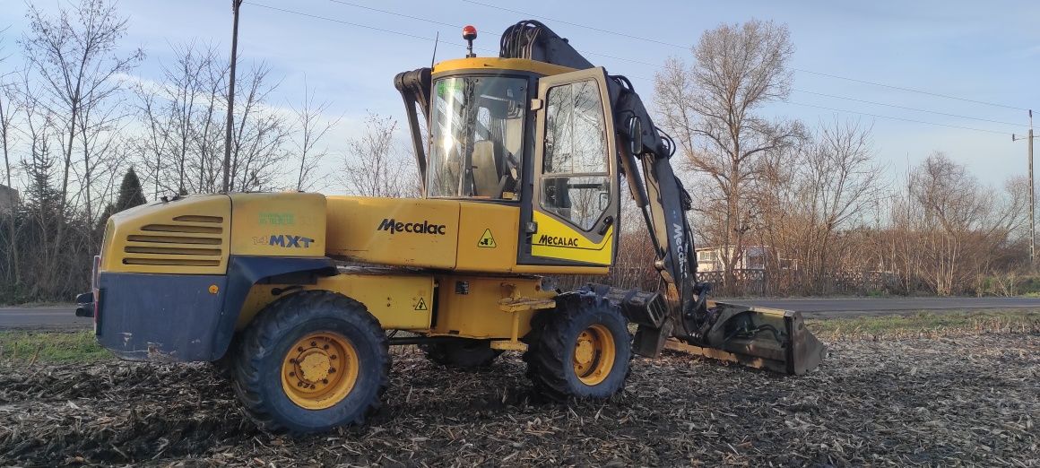 Wynajem usługi koparko ładowarki mecalac