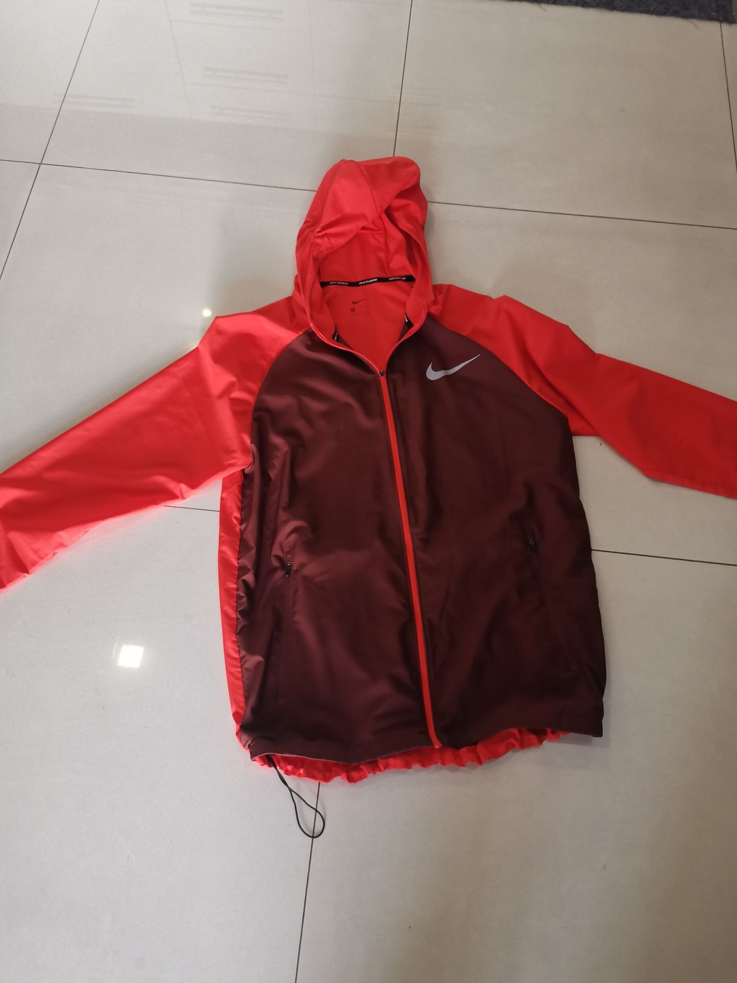 Tapa vento Nike cor laranja grana