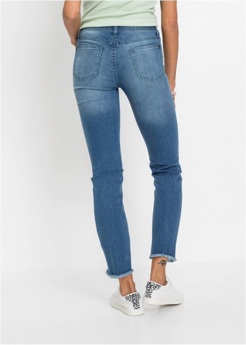 bonprix niebieskie jeansowe spodnie  z przetarciami 42/44