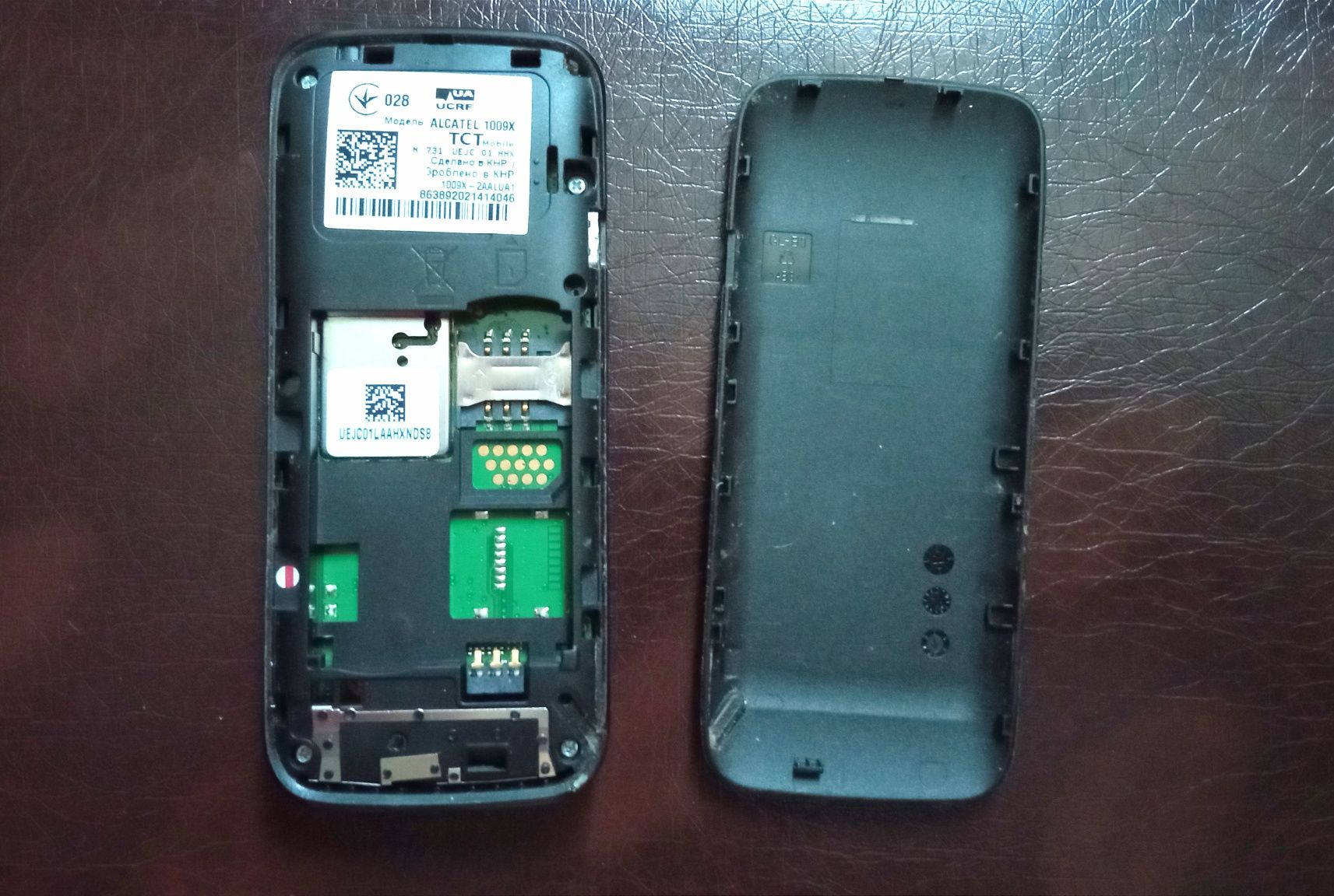 Телефон Alcatel 1009x без батареї + зарядний пристрій
