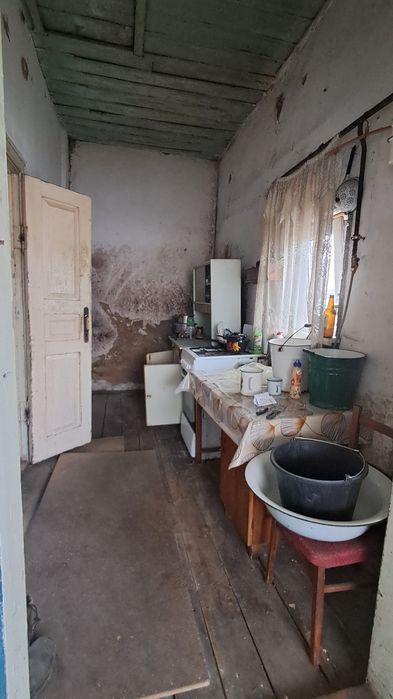 Продам 1/2 будинку в районі 1-ї школи