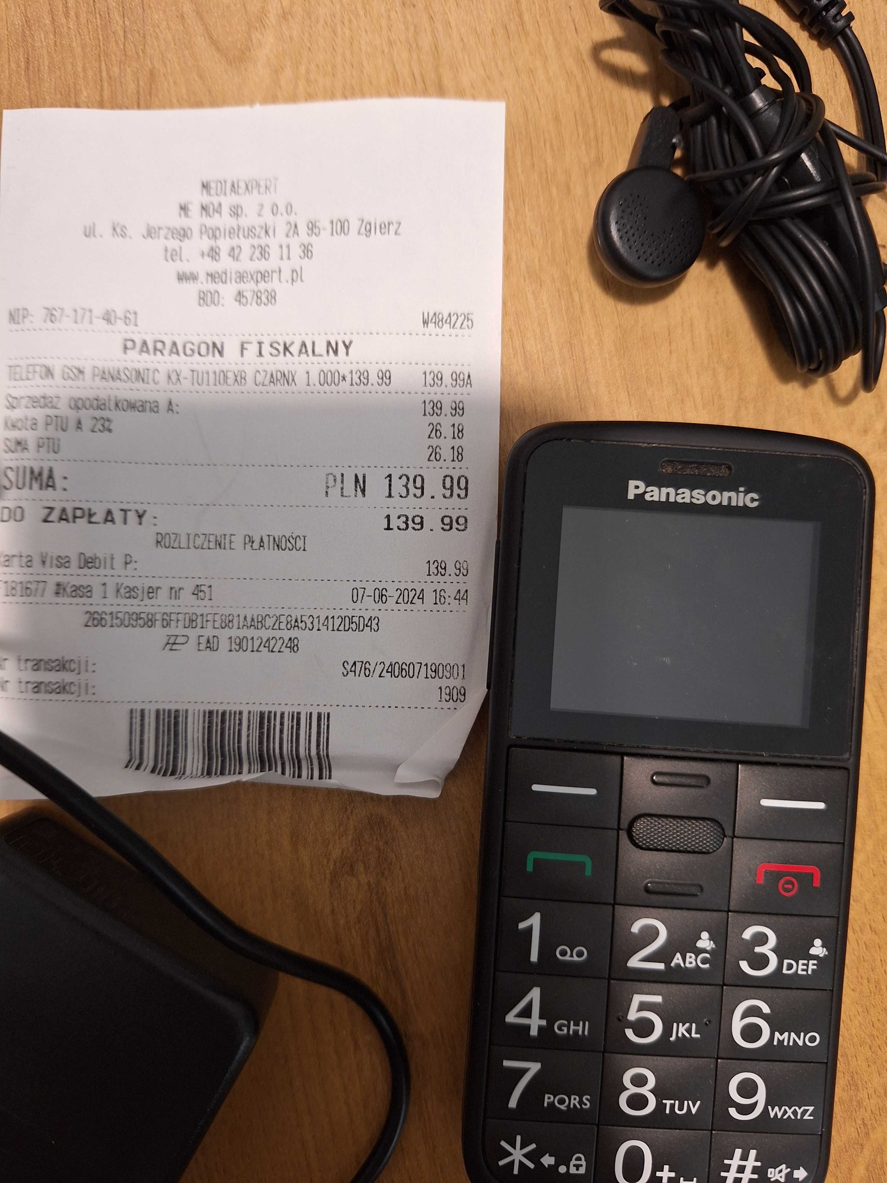 Telefon Panasonic dla seniora z ładowarką i słuchawkami