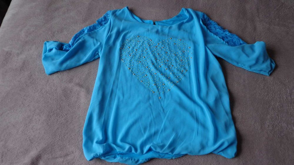 Бірюзова   блузка