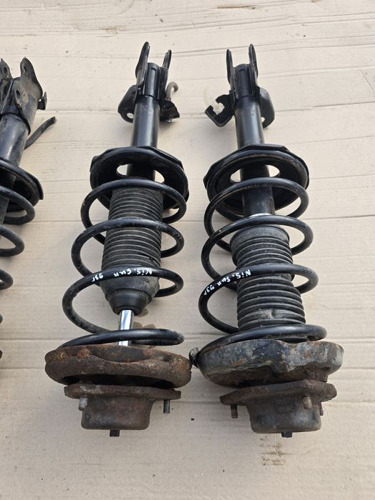 Стойки в сборе Nissan Sunny N14 91-96 левая правая передняя задняя