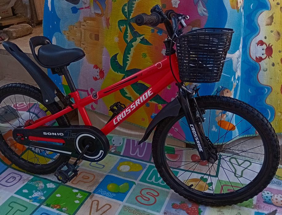 Продам дитячий спортивний велосипед на 20 дюймів Cross Ride почтиновий