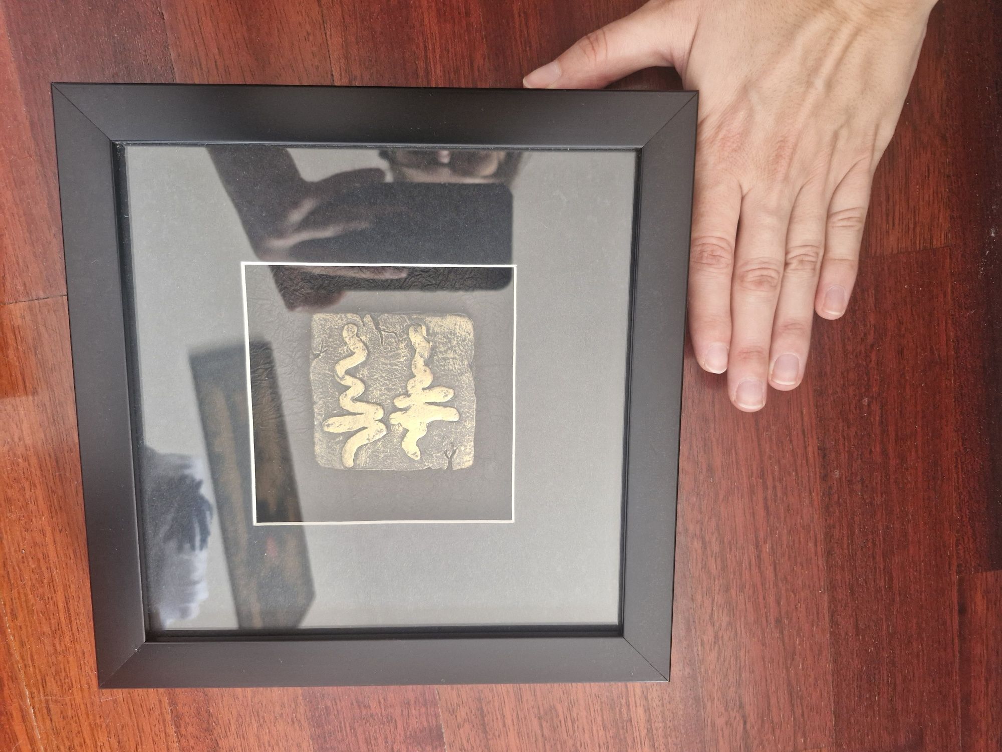 Quadro com caracteres orientais