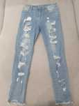 Spodnie jeans dziury