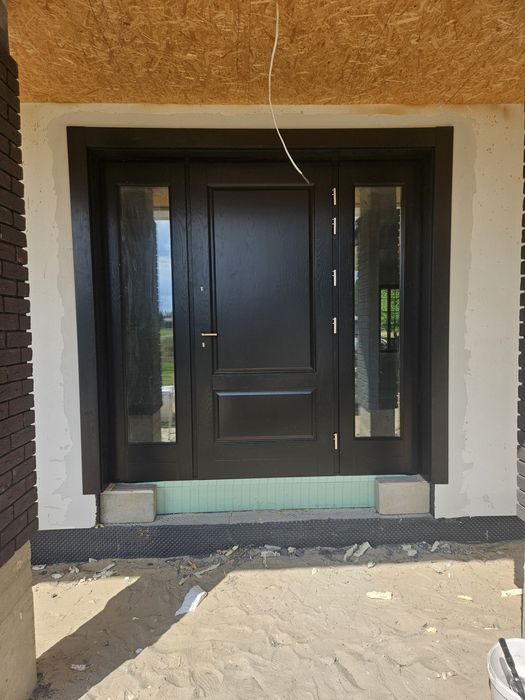 Drzwi zewnętrzne drewniane dębowe ral 3020 z montażem producent