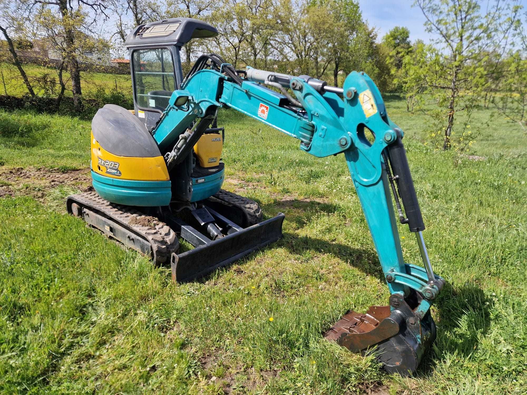 Giratória / Escavadora Kubota RX-203 - Braço articulado - 2 Toneladas