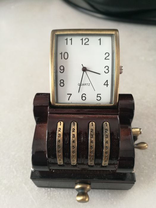 Relógio caixa registadora