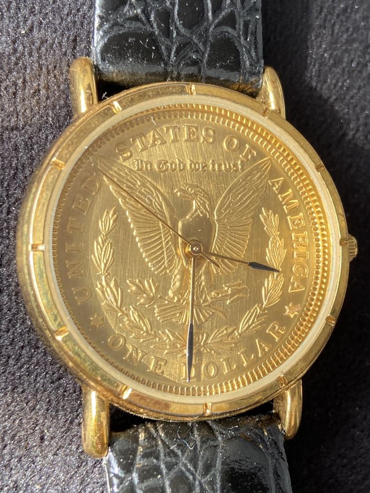 Рідкісний годинник монета