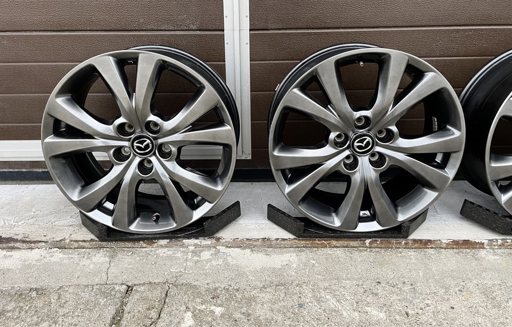 4x felgi aluminiowe 5x114,3 r18 et45 7J Alufelgi Oryginał Mazda Grafit