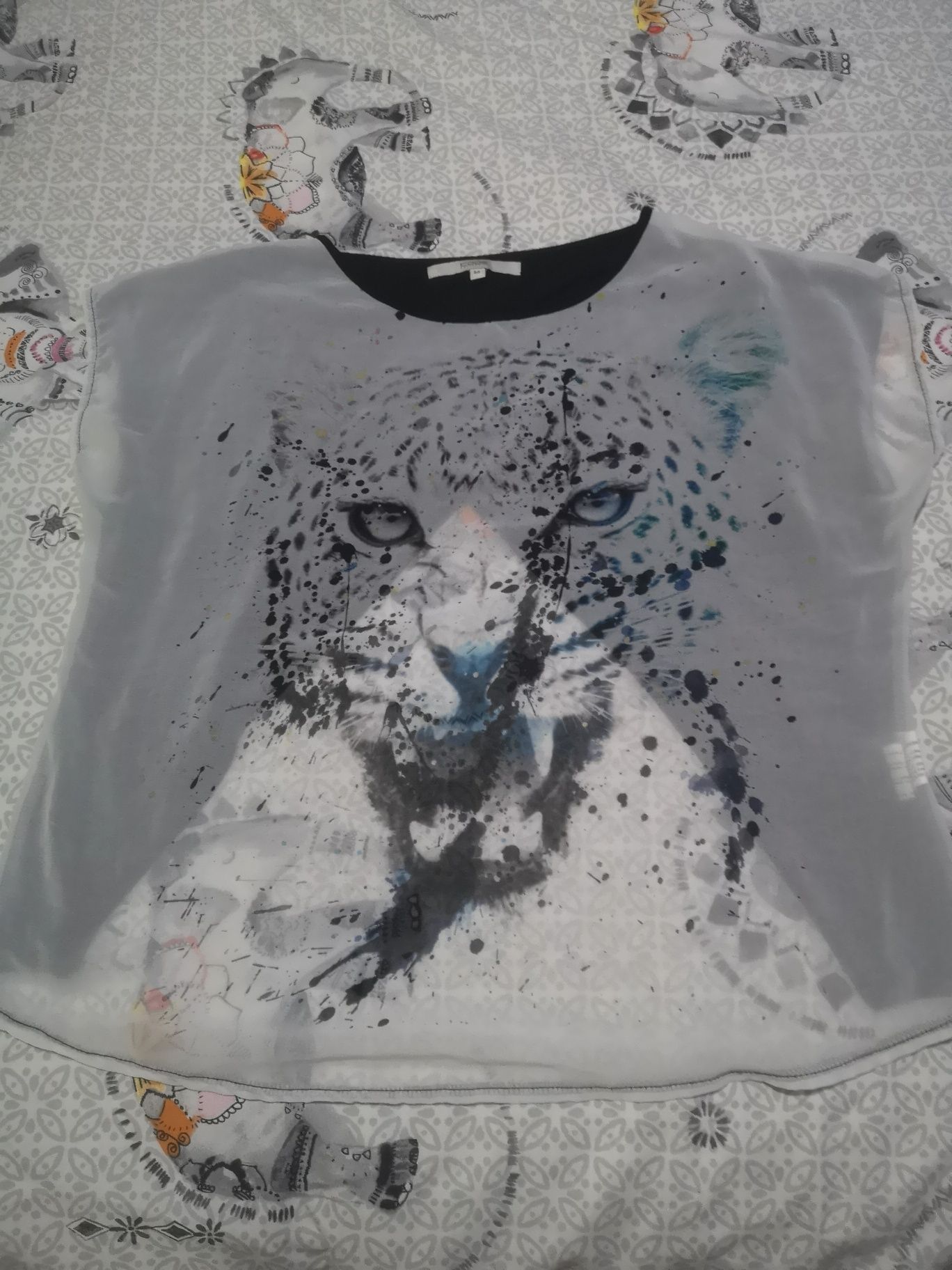 Blusa leopardo sem costas