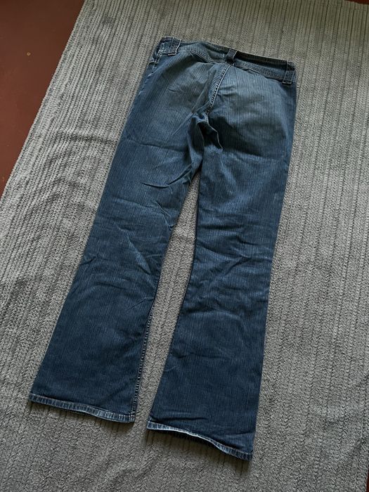 Opium клеш flered jeans темно сині