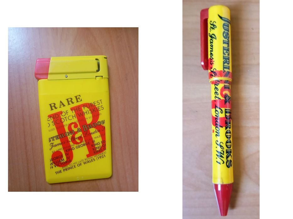 Isqueiro e caneta da marca J&B.