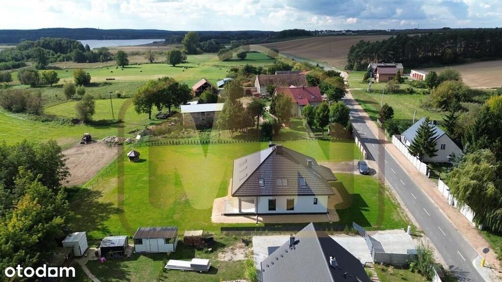 Komfortowy dom na dużej działce w otoczeniu