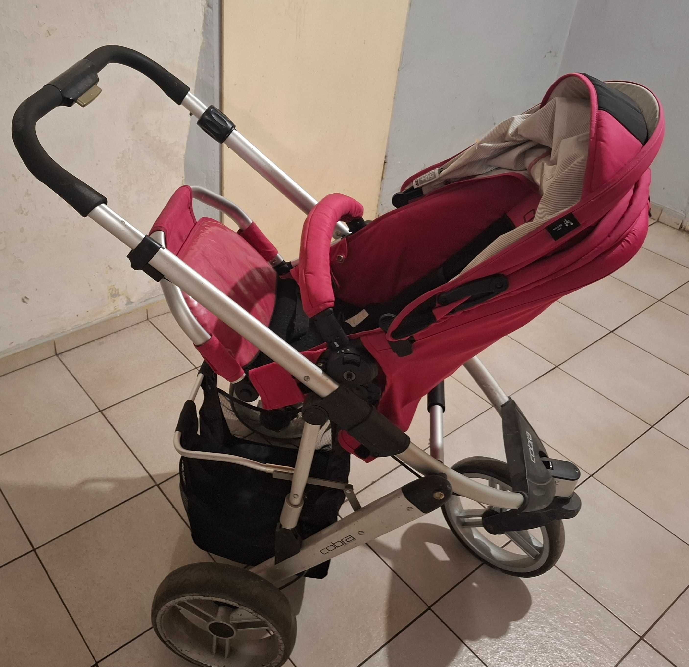 Sprzedam wózek dziecięcy 3w1 firmy Cobra kolor rózowo-czarny.