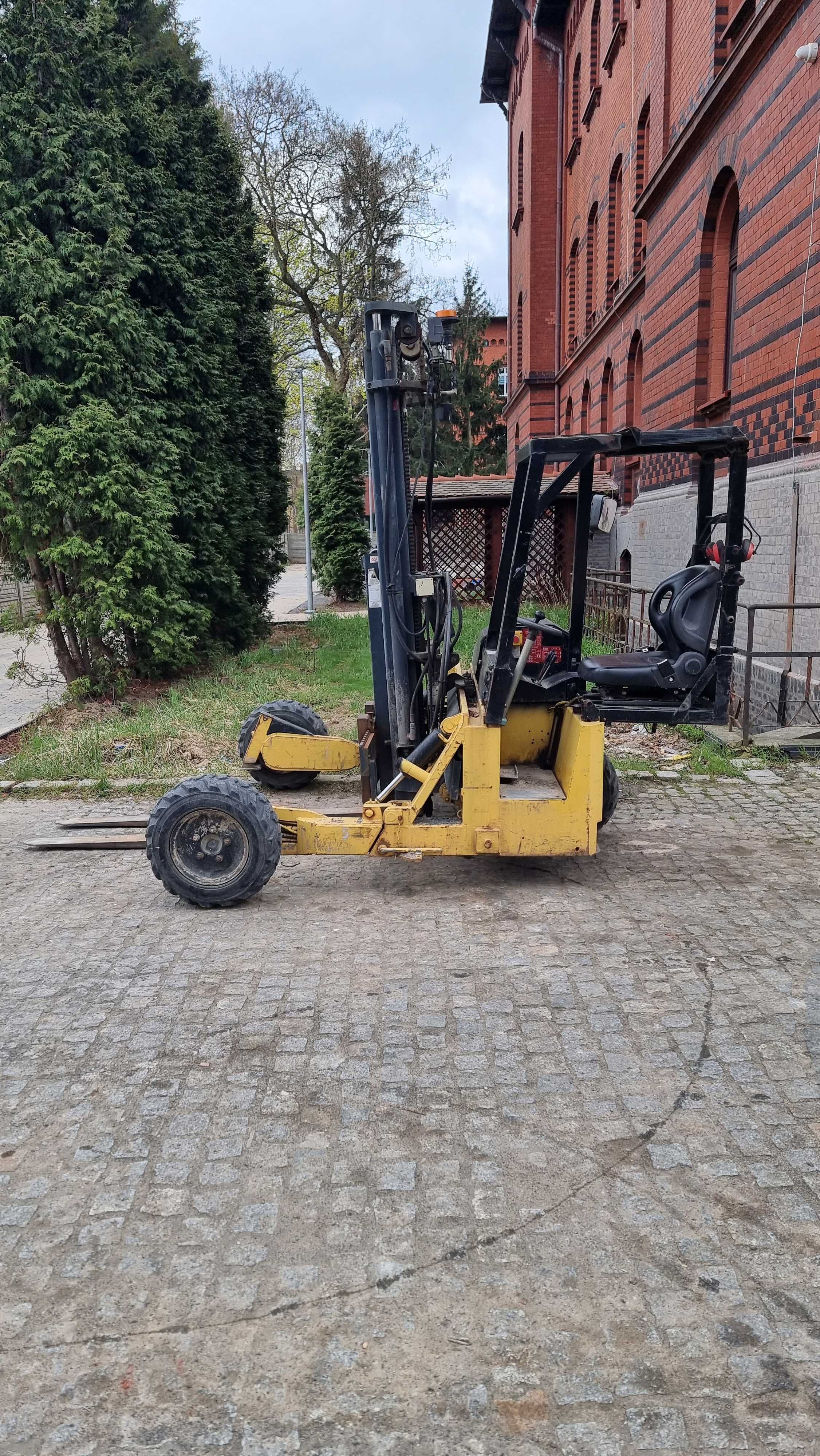 Wózek widłowy napęd 3x3 budowlany moffett M4 aktualny UDT