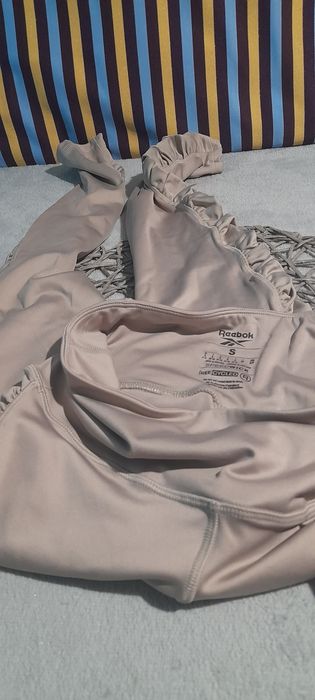 Damskie leginsy z marszczeniami po boku rozmiar S Reebok