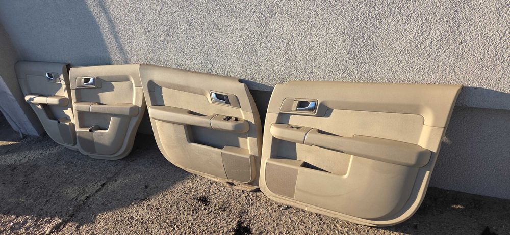 Boczki drzwi Audi A2 jasne kpl