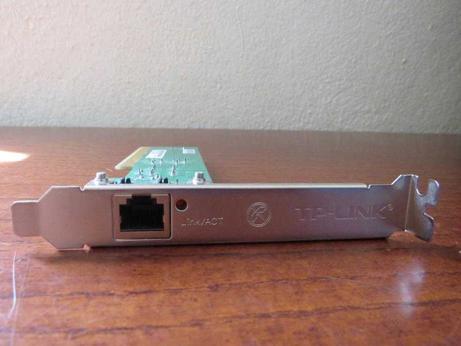 Placa rede tipo PCI marca TP-LINK velocidade até 200mbps. Estado novo