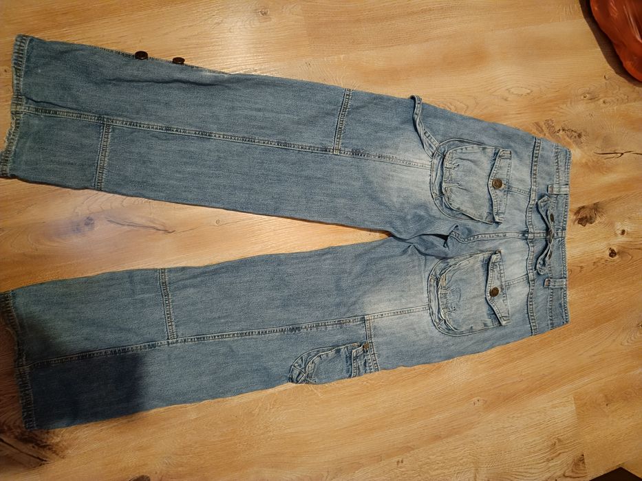 Szerokie jeansy z przetarciami New look