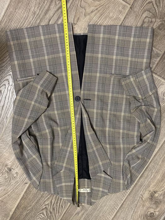 Костюм брючний в клітинку