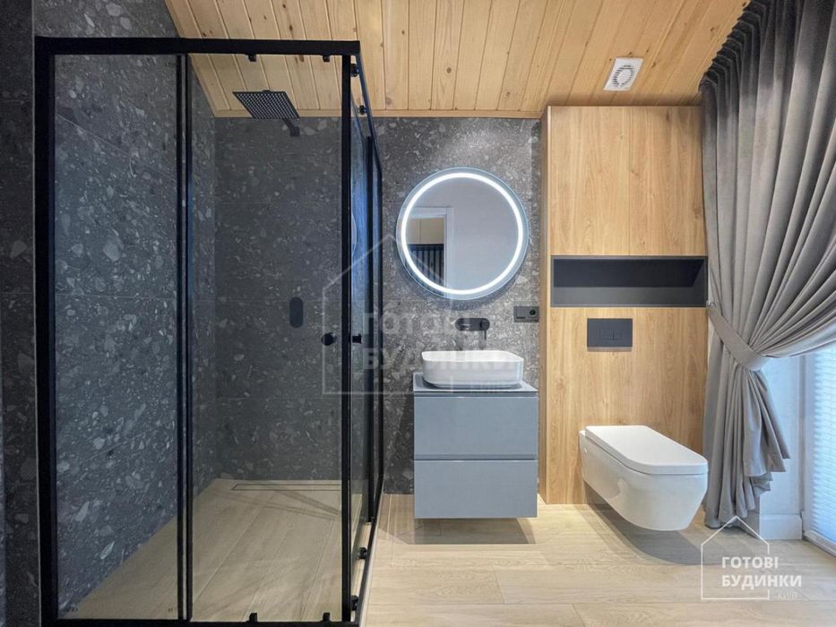 Сучасний будинок серед соснового лісу в КМ Нова Ходосівка