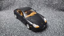 Модель Porsche Carrera 911 (1997) масштаб 1:24 Bburago
