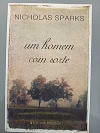 Um Homem Com Sorte	de Nicholas Sparks	Como novo!