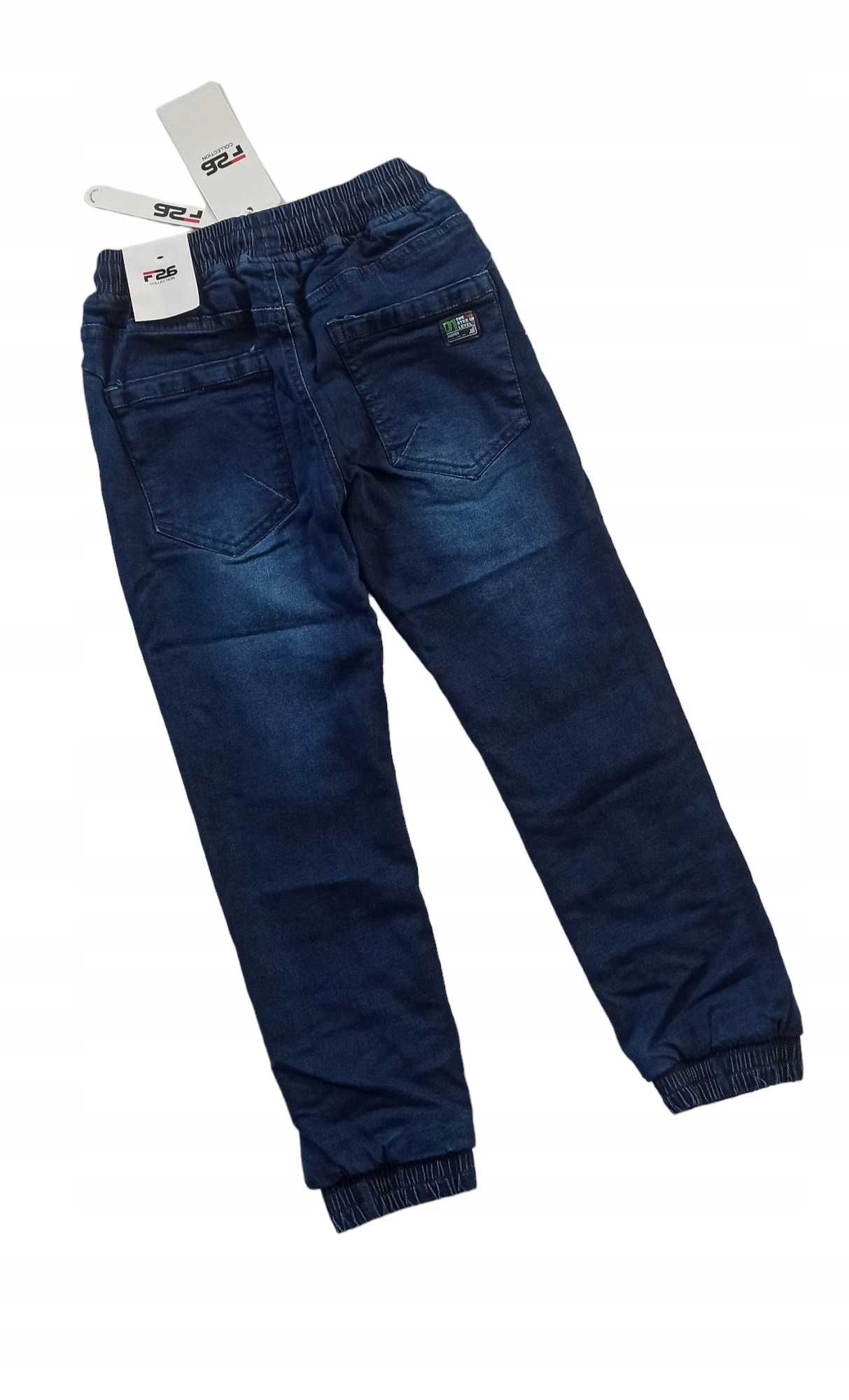 Spodnie Jeans miękkie elastyczne GUMA ocieplane polarem nowy r 134-140