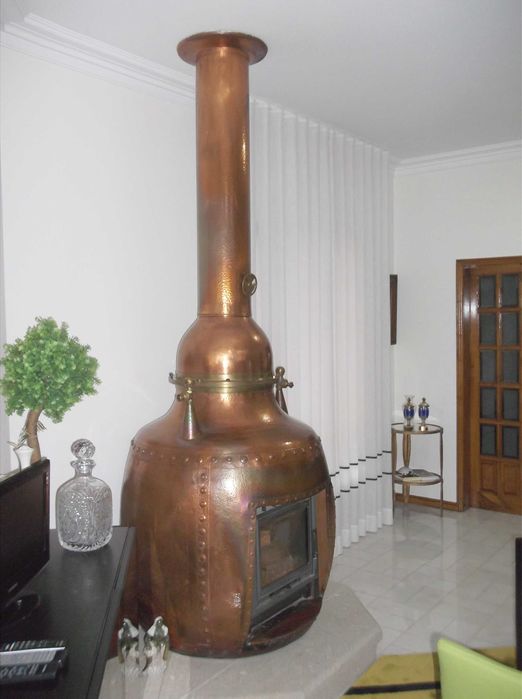 Fogão em cobre martelado.