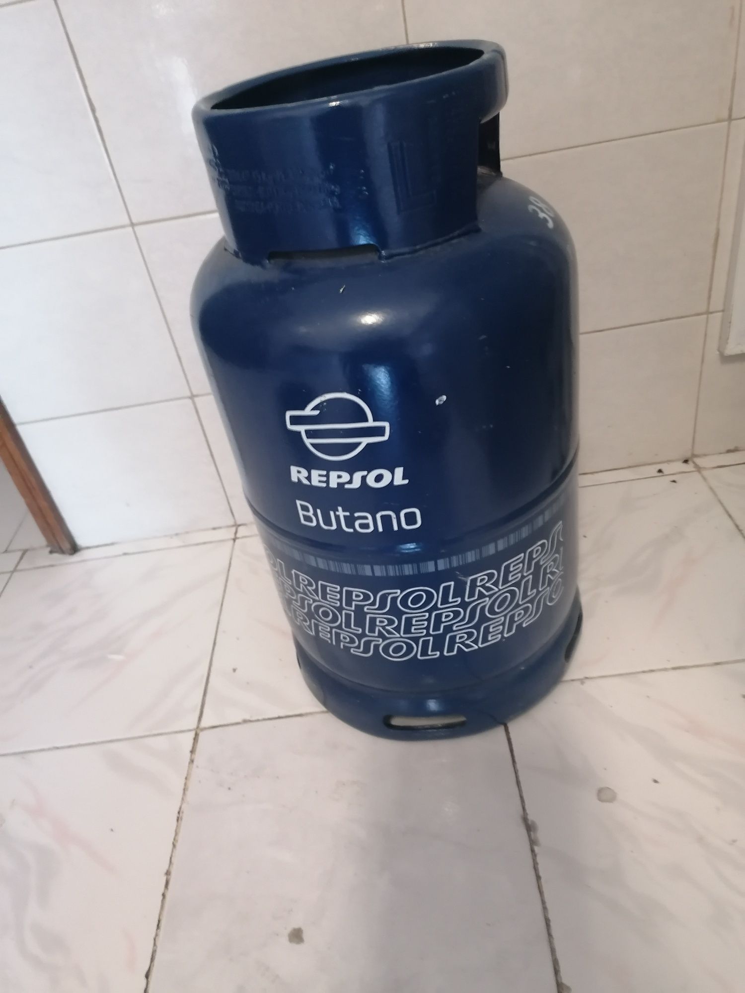 Vasilhame de gaz com redutor para desocupar