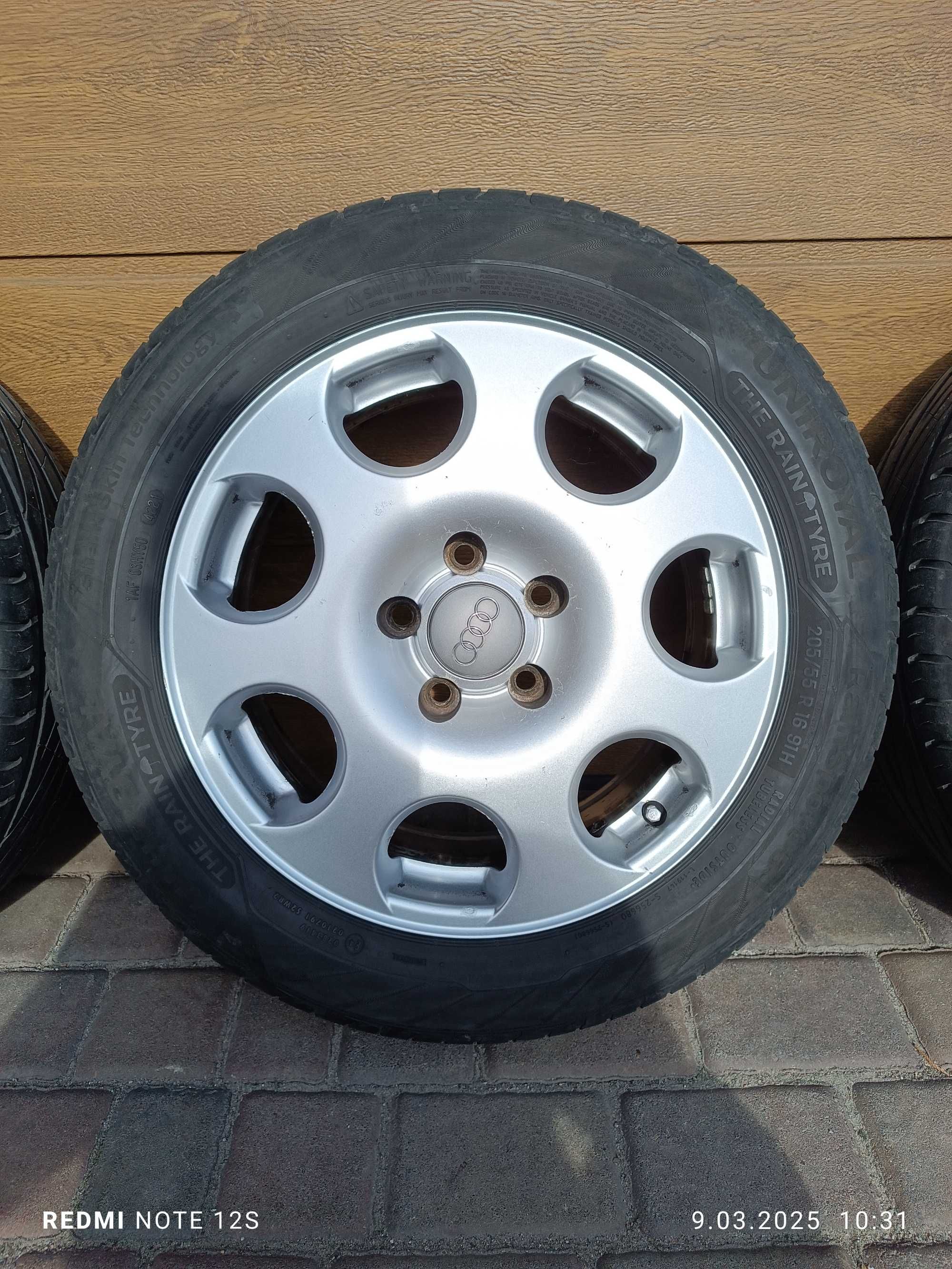 Koła felgi R16" Audi A4 / A6 alu 205/55R16 Uniroyal Rainsport 5