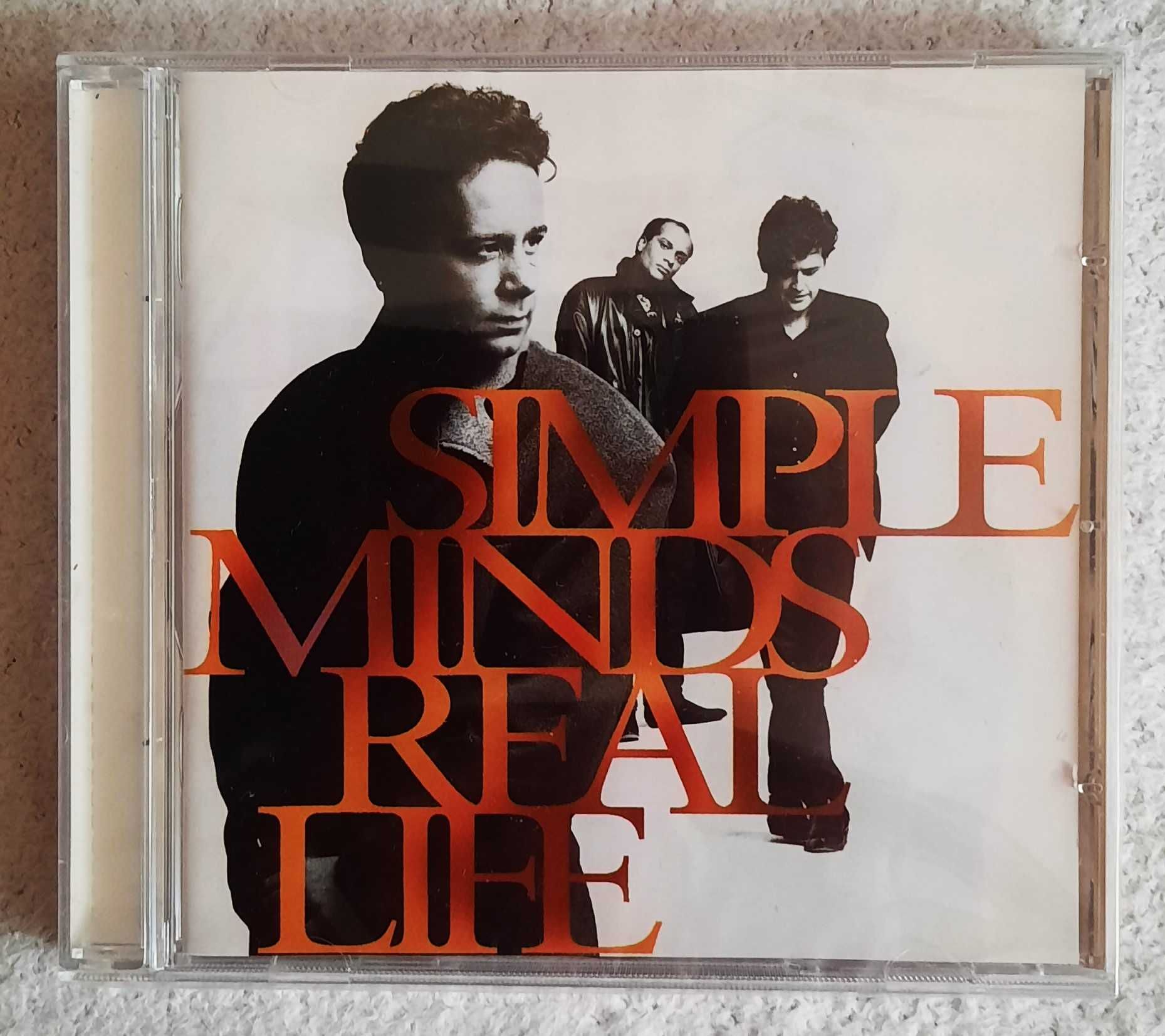 Znakomity Album Cd  SIMPLE  MINDS - Album Real Life  !