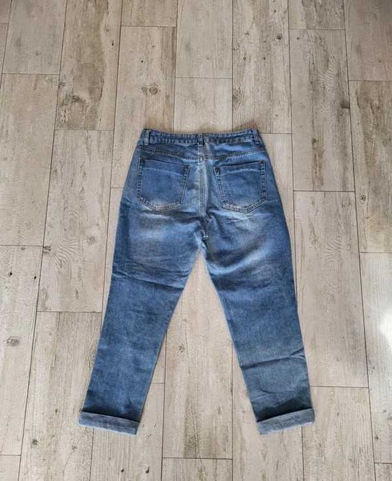 Spodnie z wysokim stanem spodnie z przetarciami 38