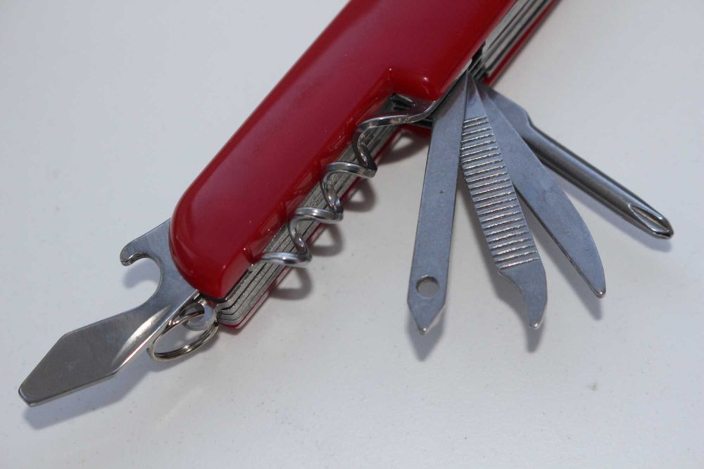 Кишеньковий ніж складний мультитул 11в1 ножиці, викрутак, пила, штопор