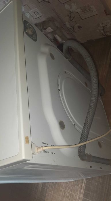 Стиральная машина Атлант 50У86, работает нормально